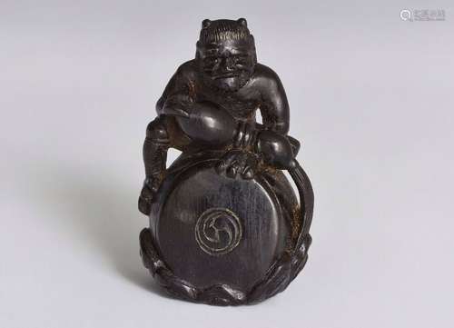 A Meiji Era Japanese Wooden Carved Netsuke Of Raiden