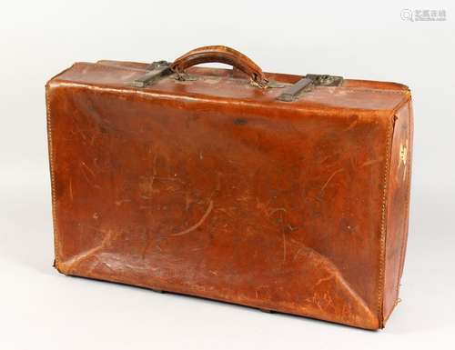 A LEATHER REVELATION SUITCASE. 24ins long.