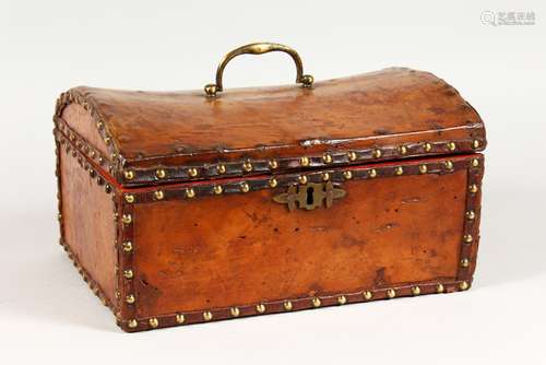 AN 18TH/19TH CENTURY LEATHER AND BRASS STUDDED DOME TOP CASKET. 11.5ins wide.