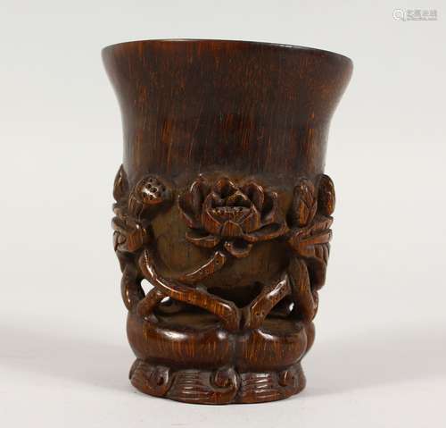 A CHINESE CARVED HORN CUP. 4ins high.