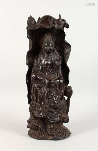 A LARGE CARVED WOOD GUANYIN FIGURE. 18ins high.