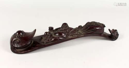 A LARGE CARVED WOOD RUYI SCEPTRE. 19ins long.