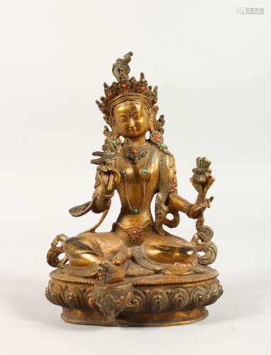 A GILT BRONZE GOD FIGURE, with coral beads. 9ins high.