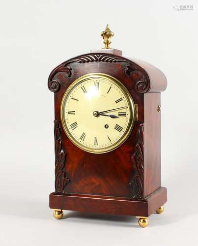 A 19TH CENTURY MAHOGANY CASED BRACKET CLOCK by RUSSELL OF LONDON, CIRCA. 1820, the case carved