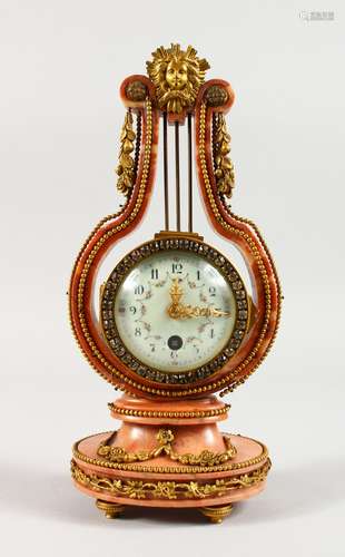 A GOOD SMALL LOUIS XVI DESIGN PINK MARBLE AND GILT LYRE CLOCK, with painted face, bead work and