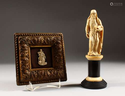 A 19TH CENTURY IVORY FIGURE ON STAND, possibly St Anne; together with a small ivory in a gilt frame.