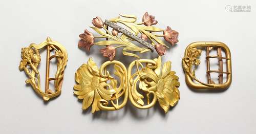 THREE GILDED BELT BUCKLES, and a hat buckle.