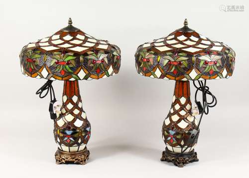 A GOOD PAIR OF TIFFANY DESIGN MULTI-COLOUR LAMPS. 22ins high.