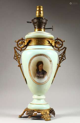 A VICTORIAN GLASS PORTRAIT TWO-HANDLED LAMP. 22ins high.