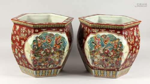 A PAIR OF CHINESE POTTERY HEXAGONAL PLANTERS. 1ft 2ins.