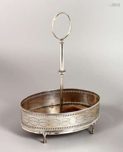 A GEORGE III OVAL CRUET STAND, with engraved decoration and pierced sides, supported on four claw