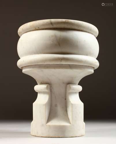 A CARVED WHITE MARBLE MORTAR, in the style of a font. 9ins high.