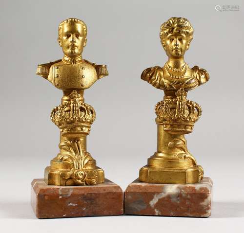 CORDIER, a pair of small cast gilt bronze busts of a military man and a woman, on marble bases. 5.