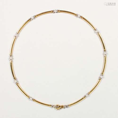 AN 18CT YELLOW GOLD AND DIAMOND NECKLACE.