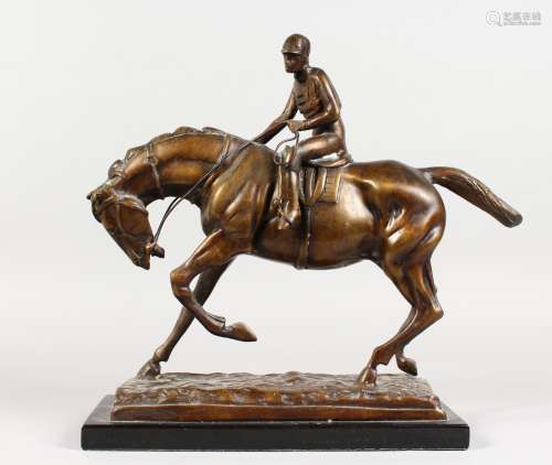 A GOOD HORSE AND JOCKEY. Fred Archer on the Queens horse, on a rectangular base with black marble