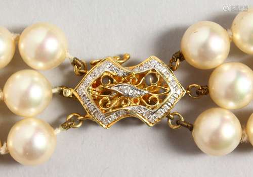 A GOOD TRIPLE-ROW PEARL NECKLACE, with 14CT GOLD CLASP.