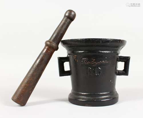 A HEAVY TWIN-HANDLED CAST IRON PESTLE AND MORTAR, signed and numbered. 6ins high.