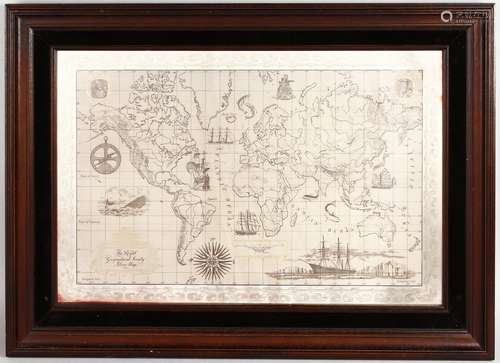 A FRAMED SILVER AND 24CT GOLD MAP OF THE WORLD.