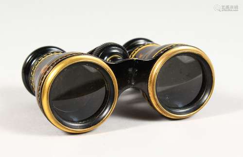 A PAIR OF TORTOISESHELL OPERA GLASSES by L. K. Leon & Co Opticians, 167 Piccadilly, London.