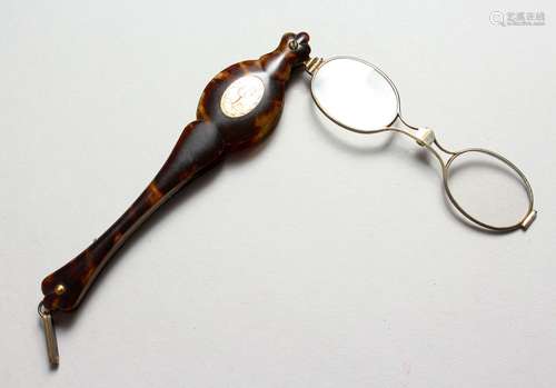 A PAIR OF 19TH CENTURY TORTOISESHELL LORGNETTES, with gold inlaid cartouche. 5.5ins high.