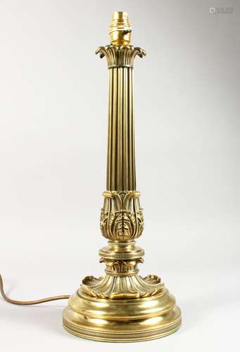 A GOOD ORNATE BRASS TABLE LAMP BASE. 17.5ins high including fitting.