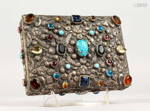 A GOOD INDIAN RECTANGULAR SILVER BOX AND COVER inset with coloured stones, 16cm long x 11.5cm deep x