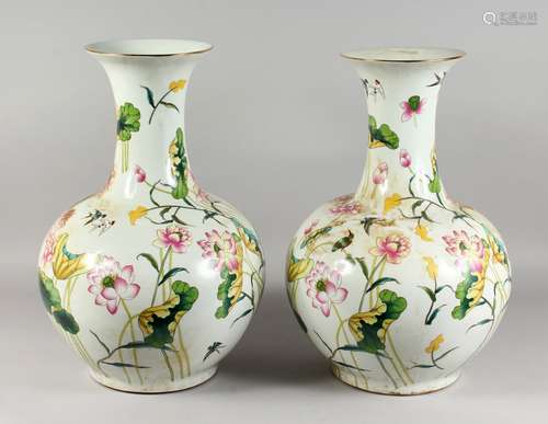 A LARGE PAIR OF CHINESE FLORAL DECORATED VASES.