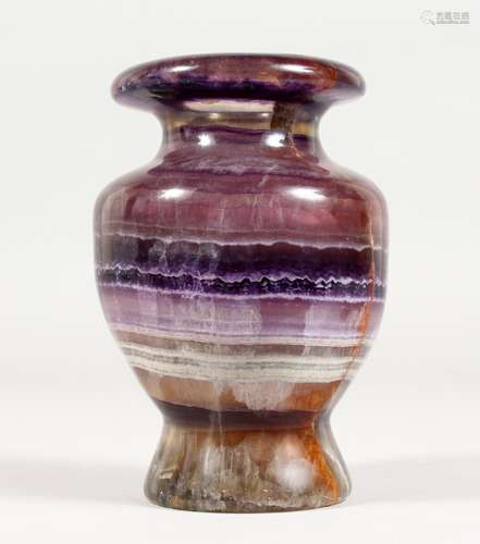 A TURNED BLUE JOHN URN. 6ins high.