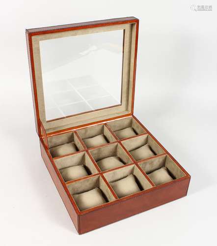 A GOOD LEATHER WATCH BOX with nine compartments.