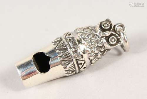 A NOVELTY SILVER OWL WHISTLE.