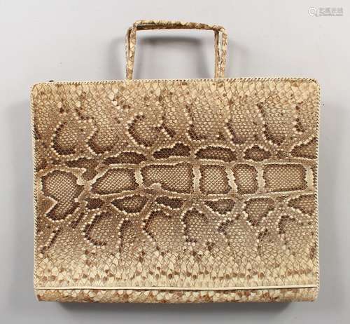 A LARGE SNAKESKIN BAG.