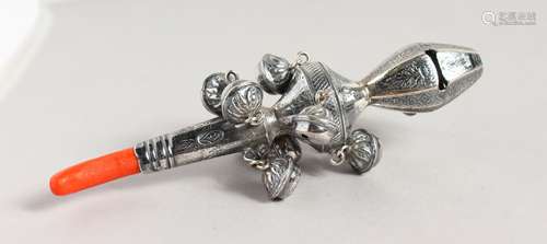 A SILVER AND CORAL BABIES RATTLE.