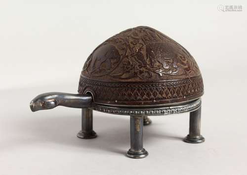 A RARE SILVER AND COCONUT SHELL CLOCK, formed as a tortoise with 18th century Vienna movement 