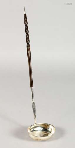 A SILVER TODDY LADLE, with oval bowl and twisted horn handle. 13ins long.