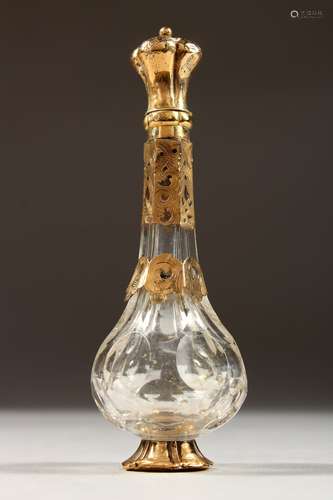 AN 18CT GOLD MOUNTED CUT GLASS SCENT BOTTLE.