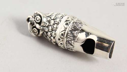 A NOVELTY SILVER OWL WHISTLE.