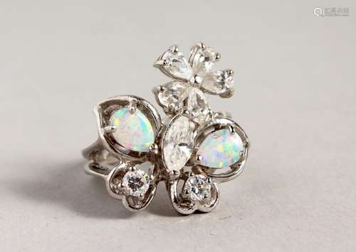 A SILVER GILSON OPAL AND CZ RING.