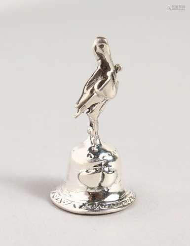 A TINY NOVELTY SILVER BIRD BELL.