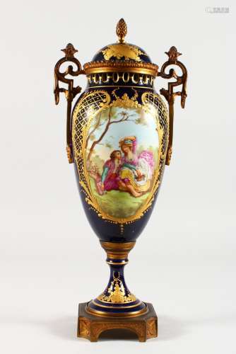 A SINGLE SEVRES DEEP BLUE TWO-HANDLED VASE AND COVER, painted with a reverse scene of young lovers