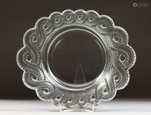 A HEAVY CIRCULAR LALIQUE DISH, with scalloped sides. Etched LALIQUE, FRANCE. 11ins diameter.