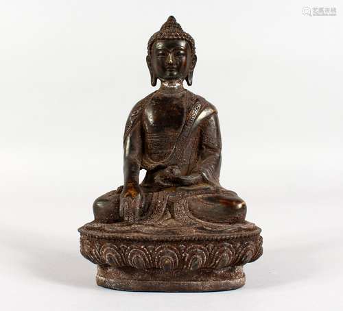 AN EARLY BRONZE SEATED BUDDHA. 8ins high.