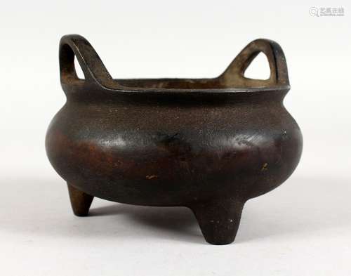 A CHINESE BRONZE CIRCULAR CENSER with leopard handles. Impressed mark. 4.5ins diameter.