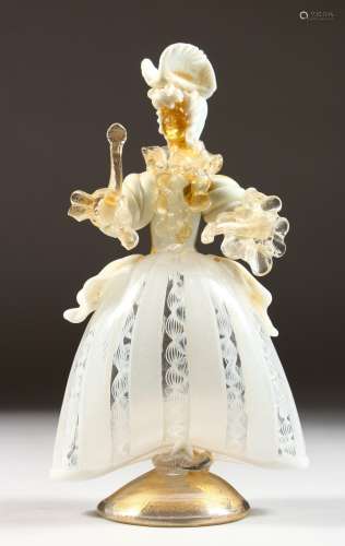 A VENETIAN MOULDED GLASS FIGURE OF A WOMAN, formed from opaque, clear and gilded glass. 8.5ins