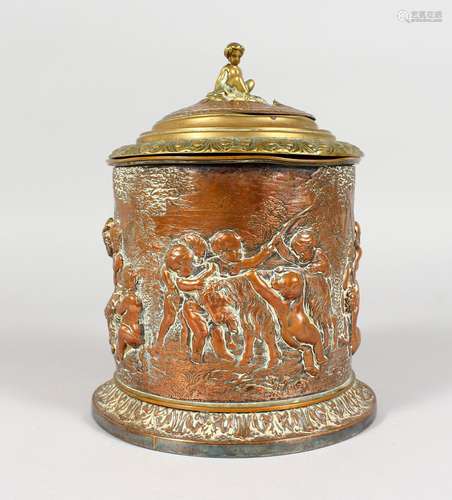 A 19TH CENTURY BRASS AND COPPER TOBACCO JAR AND COVER, decorated with cherubs and other classical