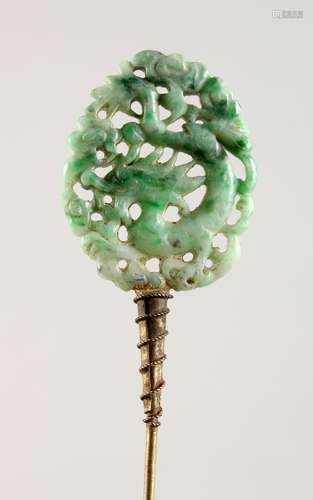 A PIERCED JADE HAIRPIN.