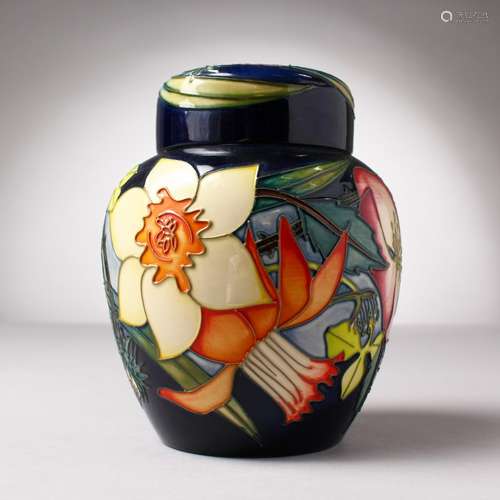 A MOORCROFT POTTERY GINGER JAR AND COVER, 