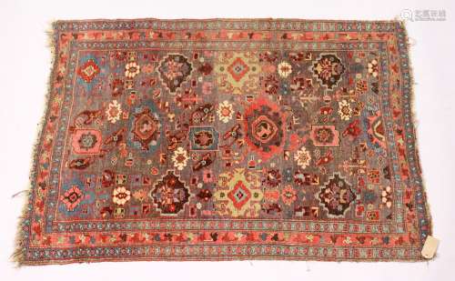 A PERSIAN BIDJAR RUG, EARLY 20TH CENTURY, Garous design, rust ground with stylised decoration. 5ft