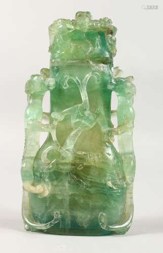 A CHINESE CARVED GREEN QUARTZ VASE AND COVER. 8ins high.