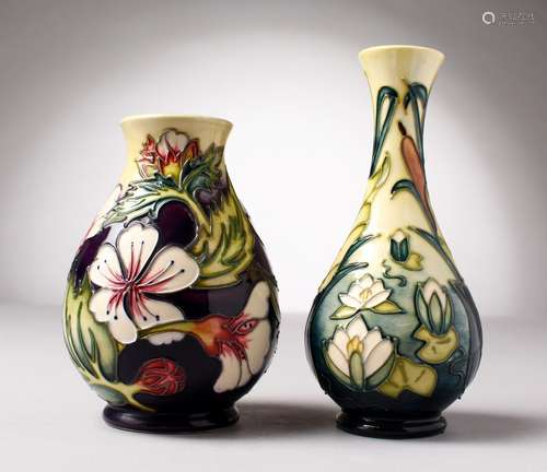 TWO SMALL MOORCROFT VASES. WM, No's. 97 and 95. (2).