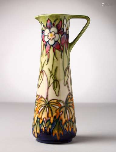 A MOORCROFT POTTERY TALL JUG. Initial R. No. 150/250. 9.5ins high.